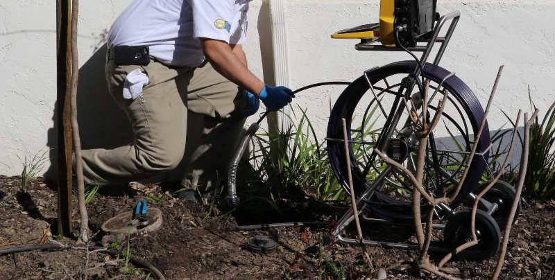 A Professional at Mike Council Plumbing and Rooter performing a pipe video inspection in the San Jose and South Bay, California, area
